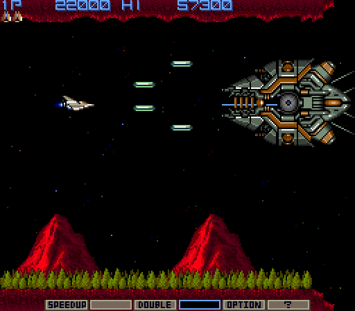 Gradius in-game screen: the Vic Viper approaching a boss over a red mountain landscape